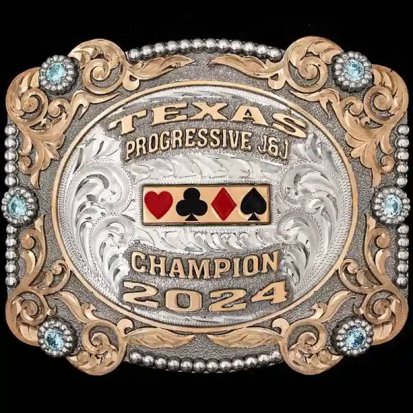 "Our Stunning Cattle Pen Buckle is designed with a striking blend of elegance and boldness, crafted for a true champion. This Buckle is crafted on a hand-engraved, German Silver base with a natural finish. The beautiful Jeweler's Bronze overlays and 